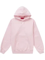Front perspective of the bold pink Supreme satin applique hoodie.