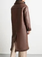 Back view of the rugged whipstitch shearling leather coat.