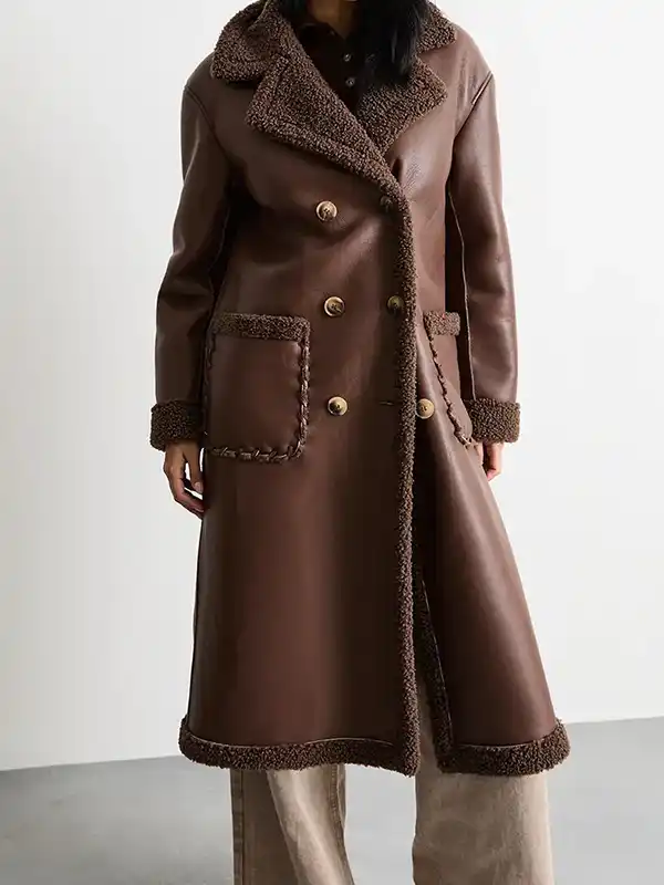 whipstitch shearling leather coat Front View Front view of the classic whipstitch shearling leather coat.