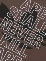 A full lifestyle shot of the Adidas Bape Head Tee showing its relaxed fit and centered collaborative branding.