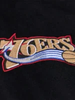 A stylish lifestyle look of the Allen Iverson Mitchell Ness Varsity Jacket.