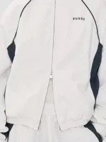 Detailed close-up of the American Idol S23 White Track Jacket.