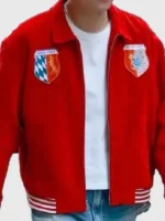 Close-up of the front closure on the BTS V Bode Wenham Red Souvenir Jacket.