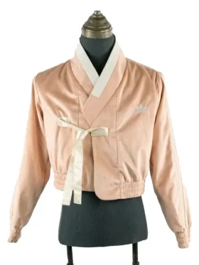 Front view of a K-pop inspired Hanbok Fusion Jacket with a minimalist body and decorative patterned sleeves.