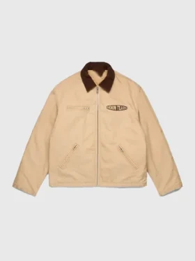 The front side of the Denim Tears Tear Star Work Jacket featuring button closures and symmetrical star graphics.