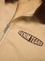 A full lifestyle view of the Denim Tears Tear Star Work Jacket showcasing its unique star pattern and casual fit.