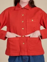 Front side of the Unisex Denim Work Jacket in Mustang Red featuring a deep rich color.