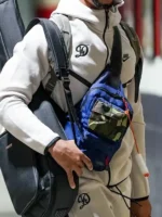 Side profile of the Dodgers 2026 Tech Fleece Jacket in motion.