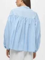 Back view of the iconic Emma Sidi Baby Blue Blouse.