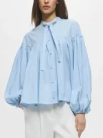 Detailed design view of the Emma Sidi Baby Blue Blouse.