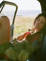 A stylish profile of the Euphoria S03 Zendaya Coleman Colorblock Jacket highlighting its contemporary drape and artistic color palette.