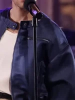 Macro texture shot of the Harry Styles SNL S51 Blue Satin Jacket.