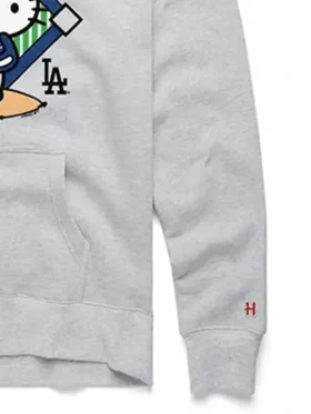 Side profile showing the Hello Kitty x Los Angeles Dodgers Hoodie sleeves.