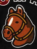 Detailed view of the hand-finished design on the Human Made varsity jacket.