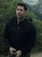 Front view of John Krasinski wearing the black cotton zip-up jacket as Jack Ryan in Tom Clancy's Jack Ryan Season 3 outdoor scene