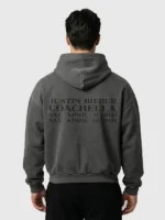 Rear profile of the Justin Bieber SWAG Coachella Hoodie showcasing its seamless back and uniform color.