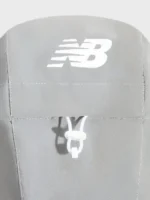 Hooded design view of the Kith New Balance Grey Reflective Jacket.