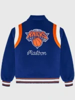 Detailed back view of the Knicks The Garden Varsity Jacket.