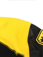 A specialized look at the intricate embroidery patterns and fabric texture on the Louis Vuitton Embroidery Varsity Jacket.