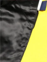 A full lifestyle look of the Louis Vuitton Embroidery Varsity Jacket featuring a luxury streetwear aesthetic.