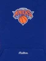 A stylish lifestyle look of the Malbon x Knicks Borough Hoodie.