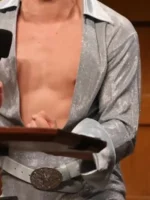 A macro perspective of the Marcello Hernandez Sequin Jumpsuit highlighting the intricate embroidery and reflective scales.