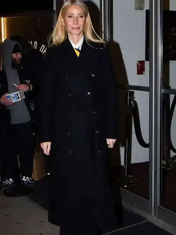 The front profile of the Marty Supreme Gwyneth Paltrow Black Coat featuring a sharp lapel and classic button-down front.