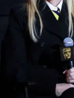 A side perspective of the Marty Supreme Gwyneth Paltrow Black Coat highlighting the neat seams and structured shoulder fit.