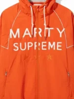 Timothee Chalamet Marty Supreme Orange Jacket close up view showing fabric texture and stitching detail