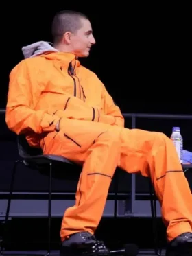 A detailed look at the premium branding and textile quality of the Timothee Chalamet Marty Supreme Orange Tracksuit.