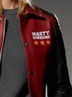 Marty Supreme Varsity Leather Jacket close-up view showing texture, stitching, and leather detail