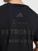 A specialized look at the graphic layout and branding on the Mercedes AMG F1 Night Driver T Shirt.