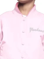 Macro shot of the NY Yankees Pink Arena Varsity Jacket material.