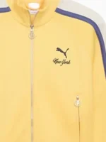 A detailed close-up of the stitching and zipper hardware on the NYC Flagship Womens Track Jacket.