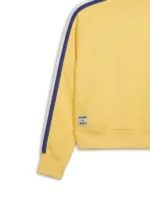 A side view of the NYC Flagship Women's Track Jacket showing the sleek athletic silhouette and sleeve detailing.