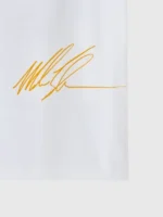 A full lifestyle display of the OVO Tyson Round 2 T-Shirt showing its relaxed athletic silhouette and bold branding.