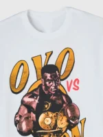 A detailed macro shot focusing on the screen-printed texture and fabric weave of the OVO Tyson Round 2 T-Shirt.