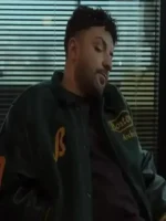 A detailed close-up of the fabric texture and fine stitching on the Per Jete Olsi Bylyku Varsity Jacket.