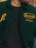 A detailed look at the front button closure and hardware of the Per Jete Olsi Bylyku Varsity Jacket.