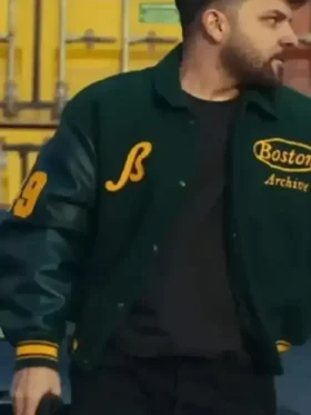 The front view of the Per Jete Olsi Bylyku Varsity Jacket featuring a classic dual tone athletic design.