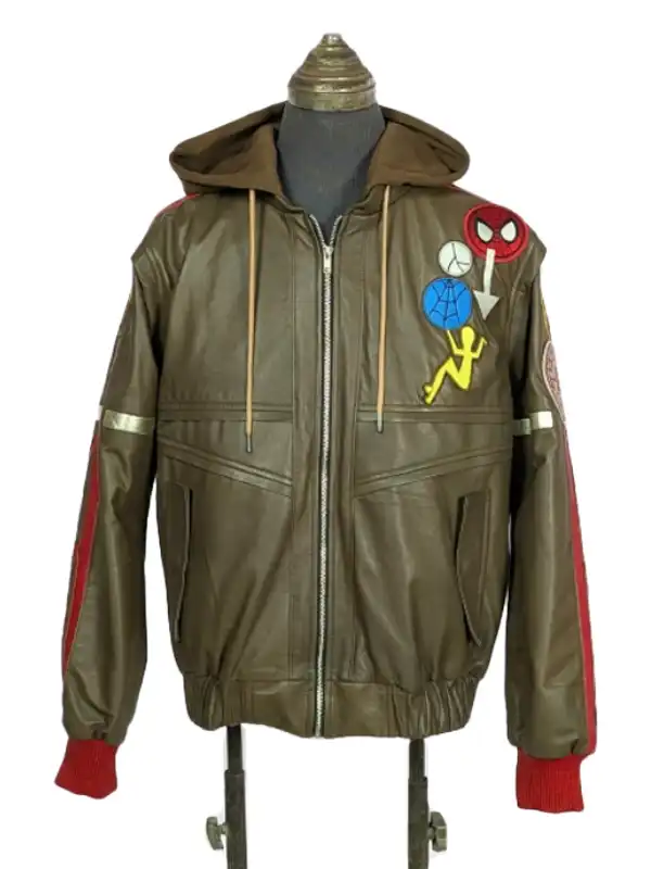 The front view of the olive green Peter Parker Photographer leather bomber jacket from Marvel Rivals, showcasing an attached brown hood, a silver front zipper, and multiple colorful pop-art patches on the left chest.