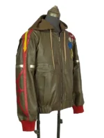 A right three-quarter side view of the olive green Peter Parker Photographer leather bomber jacket from Marvel Rivals on a mannequin, showcasing the right sleeve with its vertical red racing stripe, yellow shoulder arrow, and red forearm web patterns.