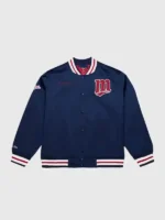 The front profile of the Puckett Minnesota Twins Satin Jacket featuring a button-down closure and team colors.