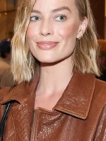 Ready or Not 2 Margot Robbie Brown Jacket close up view showing fabric texture and stitching detail