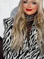 A detailed close-up of the fabric texture and fine stitching on the Scream VI Gionna Daddio Zebra Blazer.