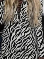 A specialized view of the overall pattern and cut of the Scream VI Gionna Daddio Zebra Blazer.