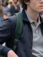 A close-up view of the fabric texture and detailed stitching on the Scream VI Jack Champion Bomber Jacket.