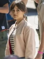 The front profile of the Scream VI Jenna Ortega Pink Jacket featuring its vibrant pink color and classic collar.