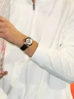 Close-up of the front closure on the Sinner Miami Open White Track Jacket.