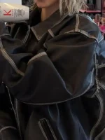 Sydney Sweeney Brown Leather Jacket close up view showing leather texture and fine stitching detail